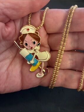 Woman Nurse Pendant Necklace in Gold with Multicolor Enamel. 
NWOT